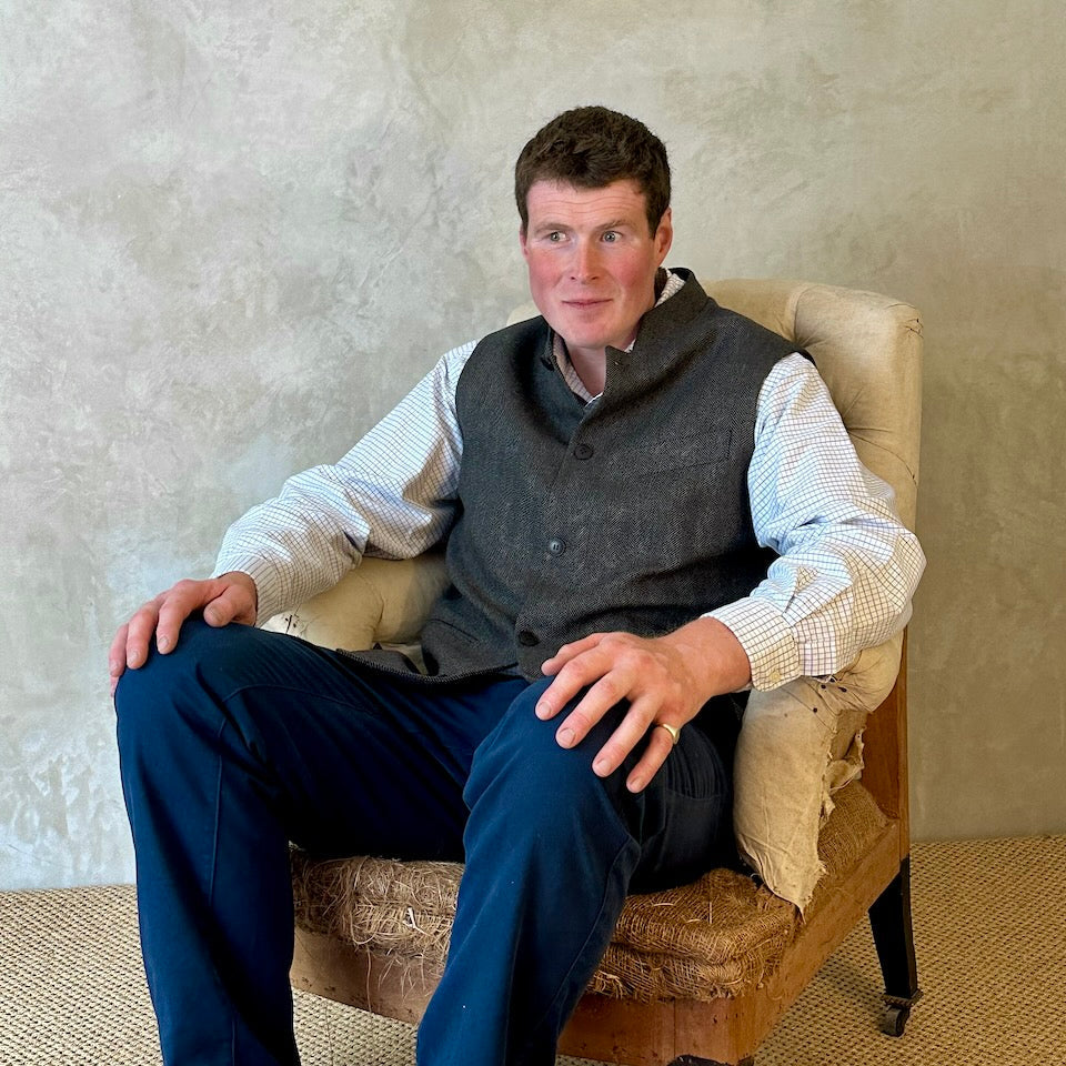A wonderfully smart alternative to a jacket or jumper, this Nehru-style gilet has a comfortable cut and ample pocket space. Warm and easy to wear, it will work from office to dinner and back again.
Five button-front and side vents for ease when moving and sitting. Fully lined. Handmade in Britain. Seated.