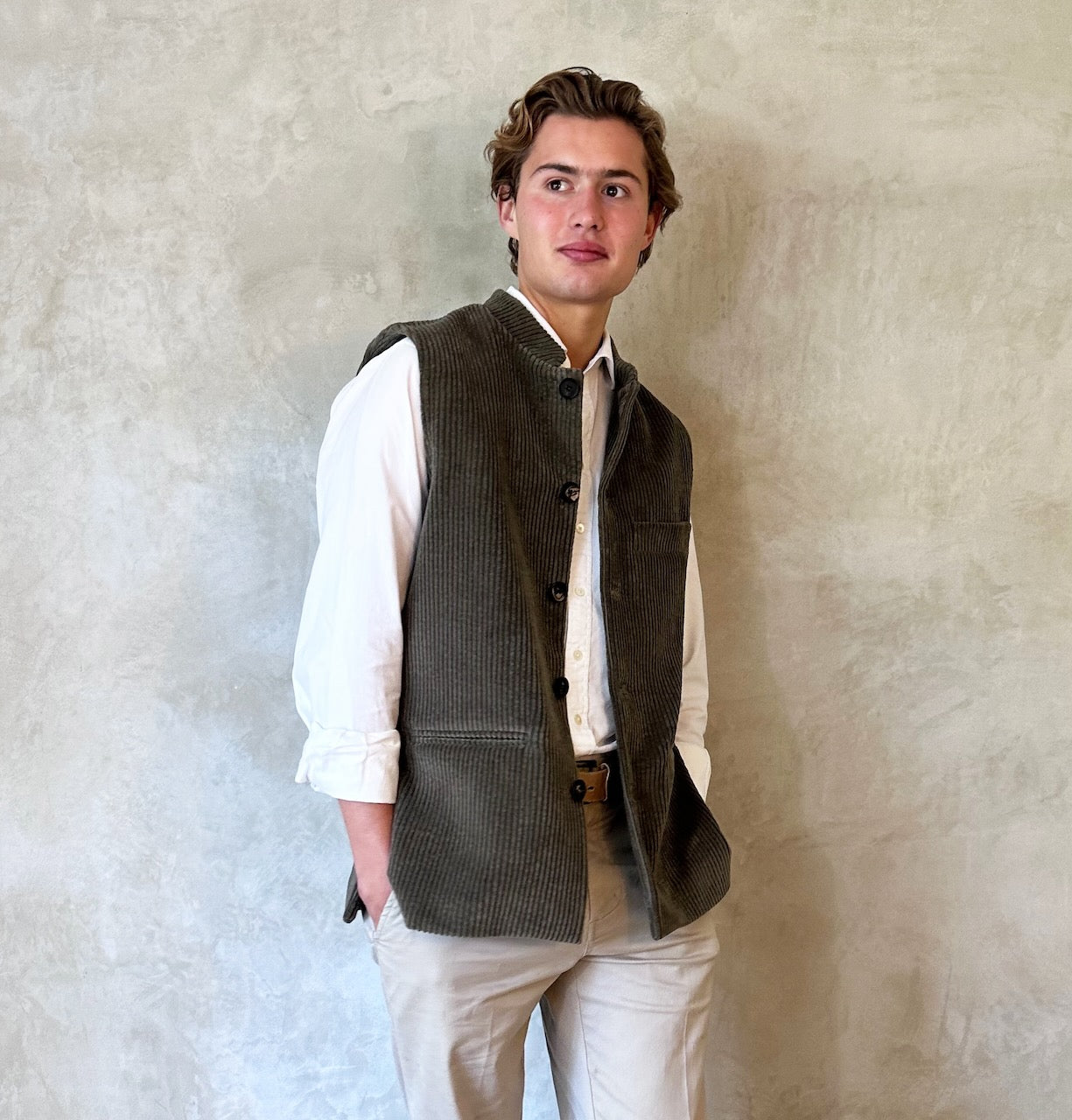 Nehru Style gilet in Khaki Cotton Corduroy. Handmade in London this gilet makes the perfect alternative to a jacket or blazer. Five pockets, Mandarin Collar. Side View.