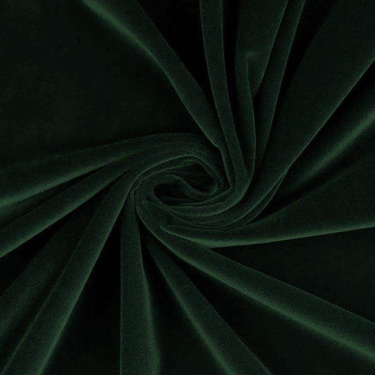 Fabric detail shot of Bottle Green Velvet Nehru-Style Gilet showing ticking lining and embroidered label.
Handmade in London.
Entirely made in Great Britain.