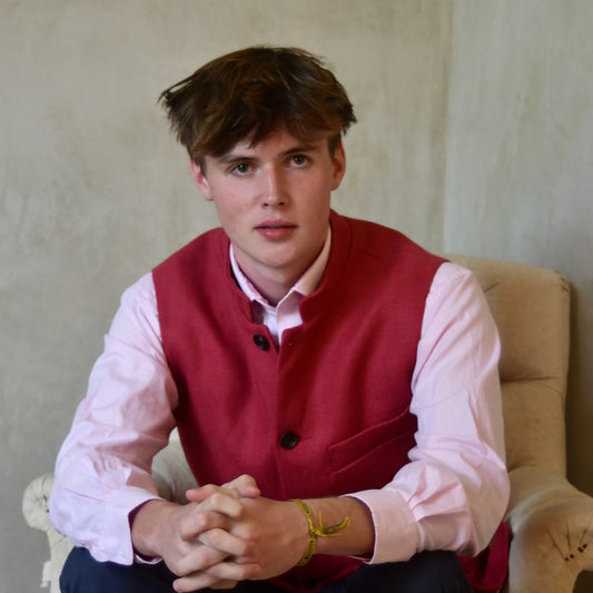 Red Linen Nehru-Style Fitted Gilet. Handmade in London. Bespoke and ready to ship. Shown buttoned over a pink shirt.