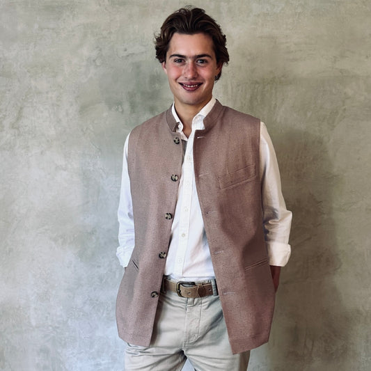 Slim fit Nehru style gilet for spring summer wear. Handmade in London this purse silk waistcoat is fully lined, has a Nehru collar and five corozo buttons to the front. With three outside and two inside pockets it is a perfect alternative to a jacket in summer. 
