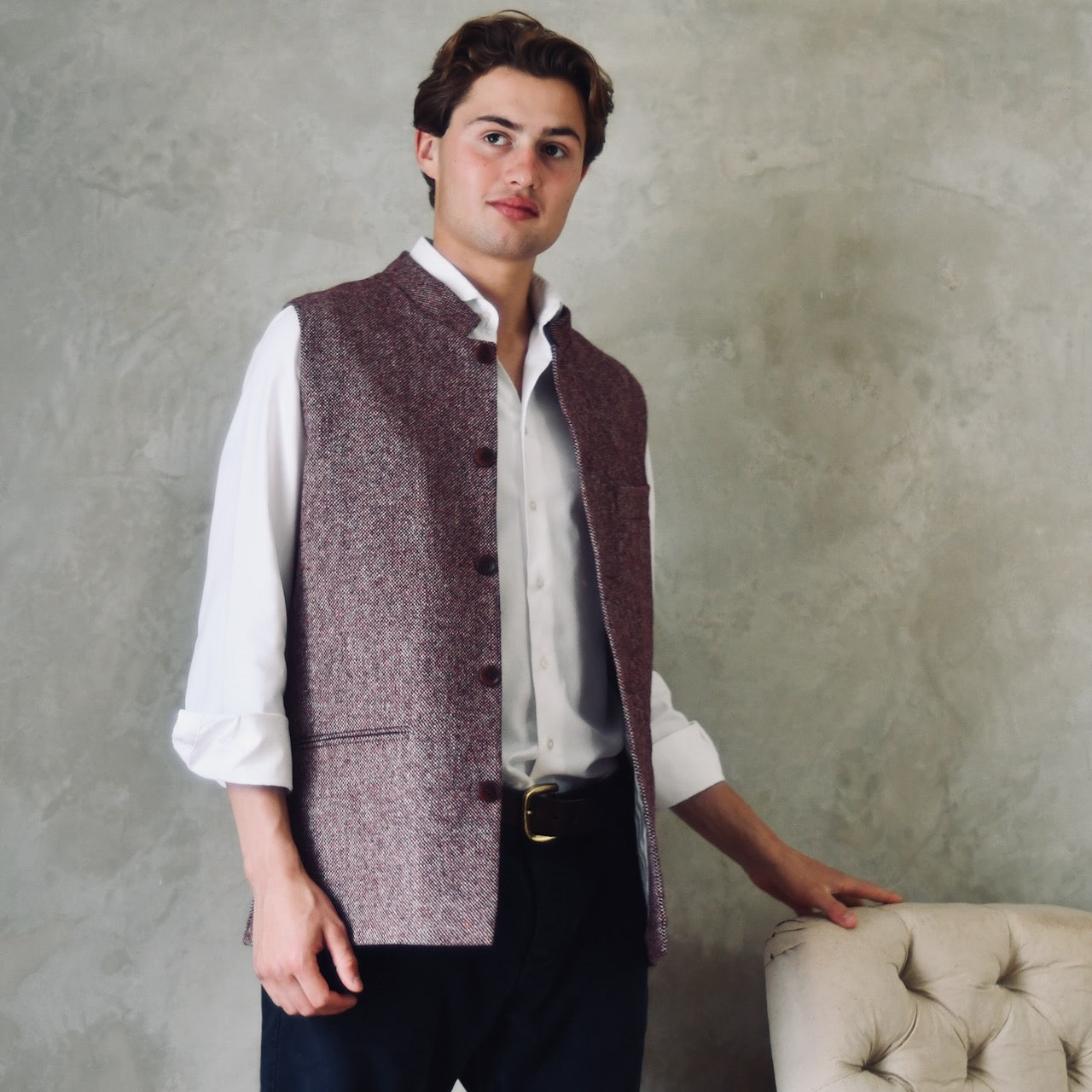 A superb and wonderfully warm alternative to a jacket for autumn winter with a neat cut and ample pocket space. Sophisticated enough for Town, Warm enough for the Country.

This fitted cut waistcoat has five button-fronts and side vents for ease when moving and sitting. Fully lined, it has generous inside facings to avoid unsightly lining slippage.

Handmade in London. Entirely made in Great Britain.