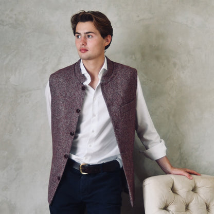 A superb and wonderfully warm alternative to a jacket for autumn winter with a neat cut and ample pocket space. Sophisticated enough for Town, Warm enough for the Country.

This fitted cut waistcoat has five button-fronts and side vents for ease when moving and sitting. Fully lined, it has generous inside facings to avoid unsightly lining slippage.

Handmade in London.