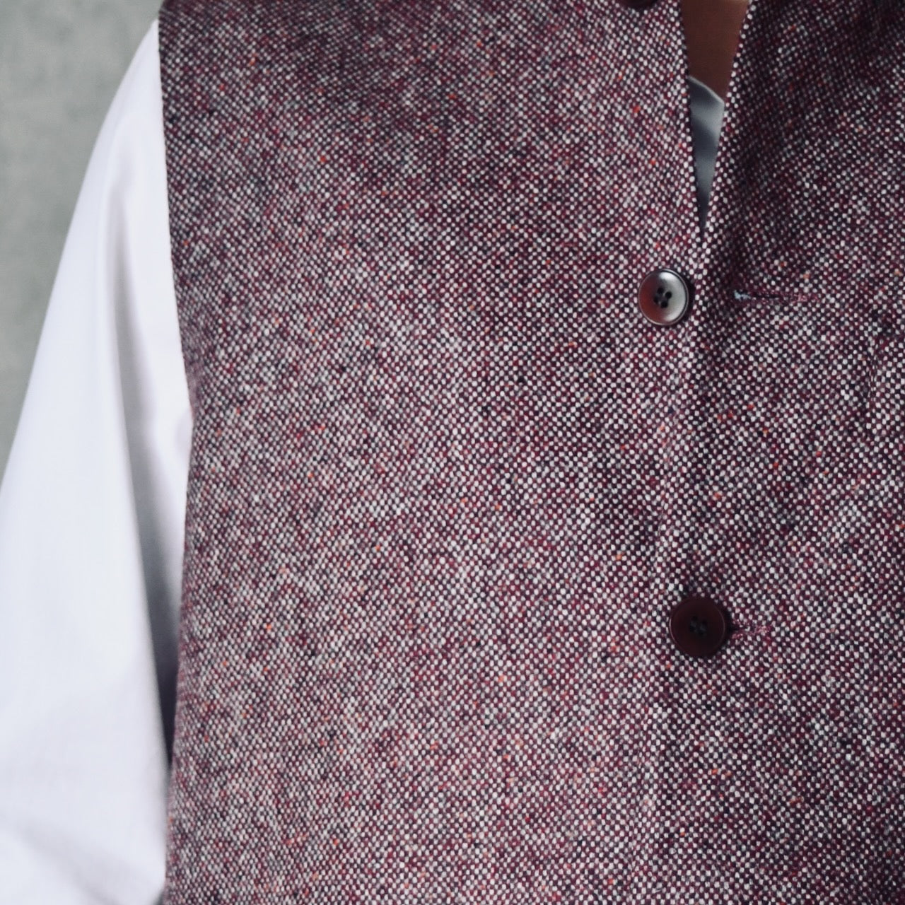 Fabric Close up of a superb and wonderfully warm alternative to a jacket for autumn winter with a neat cut and ample pocket space. Sophisticated enough for Town, Warm enough for the Country.

This fitted cut waistcoat has five button-fronts and side vents for ease when moving and sitting. Fully lined, it has generous inside facings to avoid unsightly lining slippage.

Handmade in London.