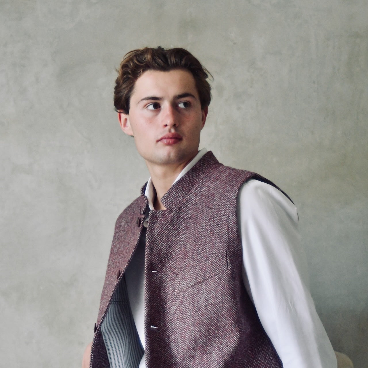 A superb and wonderfully warm alternative to a jacket for autumn winter with a neat cut and ample pocket space. Sophisticated enough for Town, Warm enough for the Country.

This fitted cut waistcoat has five button-fronts and side vents for ease when moving and sitting. Fully lined, it has generous inside facings to avoid unsightly lining slippage.

Handmade in London.