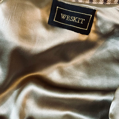 Silk Lining and embroidered label shown on a Bespoke Silk Lined Weskit Gilet in Fox Flannel gunclub in Brown.