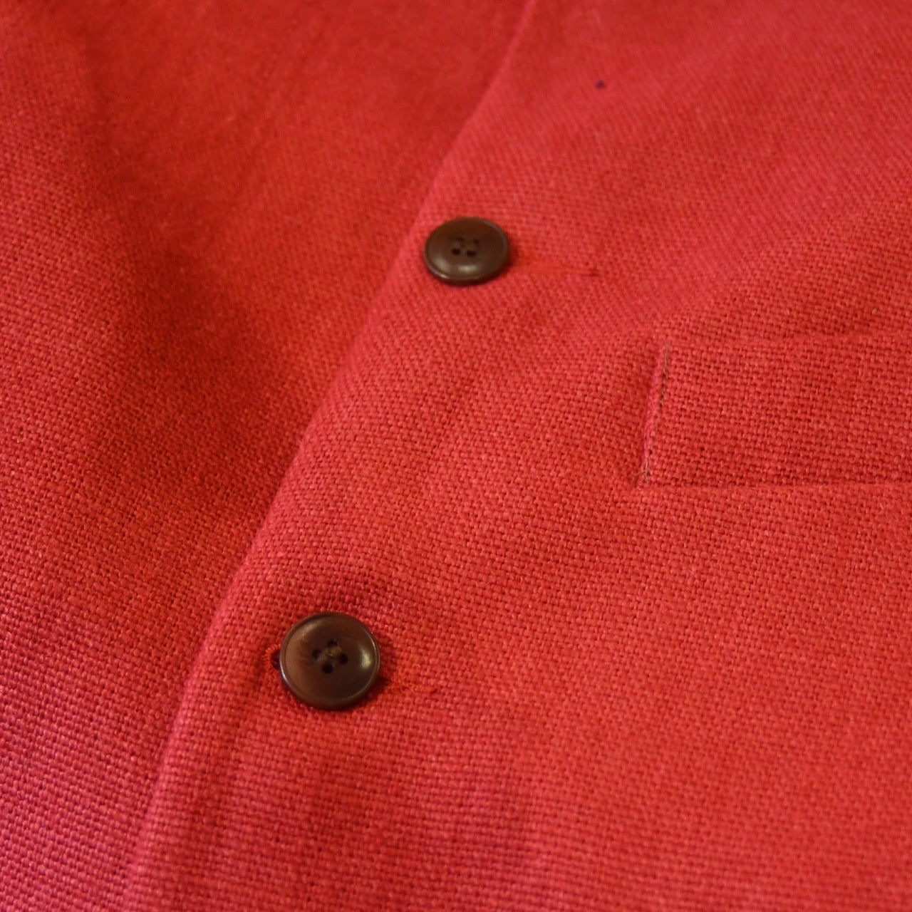 Courtney & Co  Brown Corozo buttons made in Gloucestershire for Bespoke Weskit Gilets. Handmade in London. Shown on Bespoke Red Irish Linen Waistcoat.
