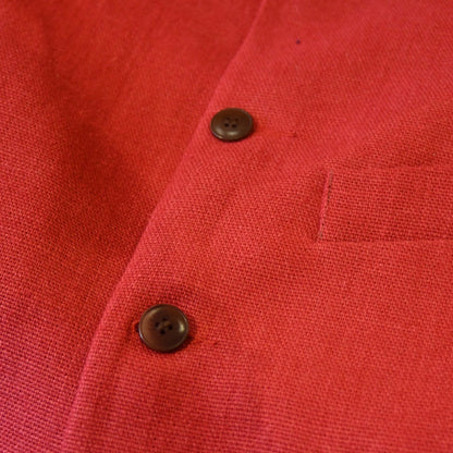 Courtney & Co  Brown Corozo buttons made in Gloucestershire for Bespoke Weskit Gilets. Handmade in London. Shown on Bespoke Red Irish Linen Waistcoat.