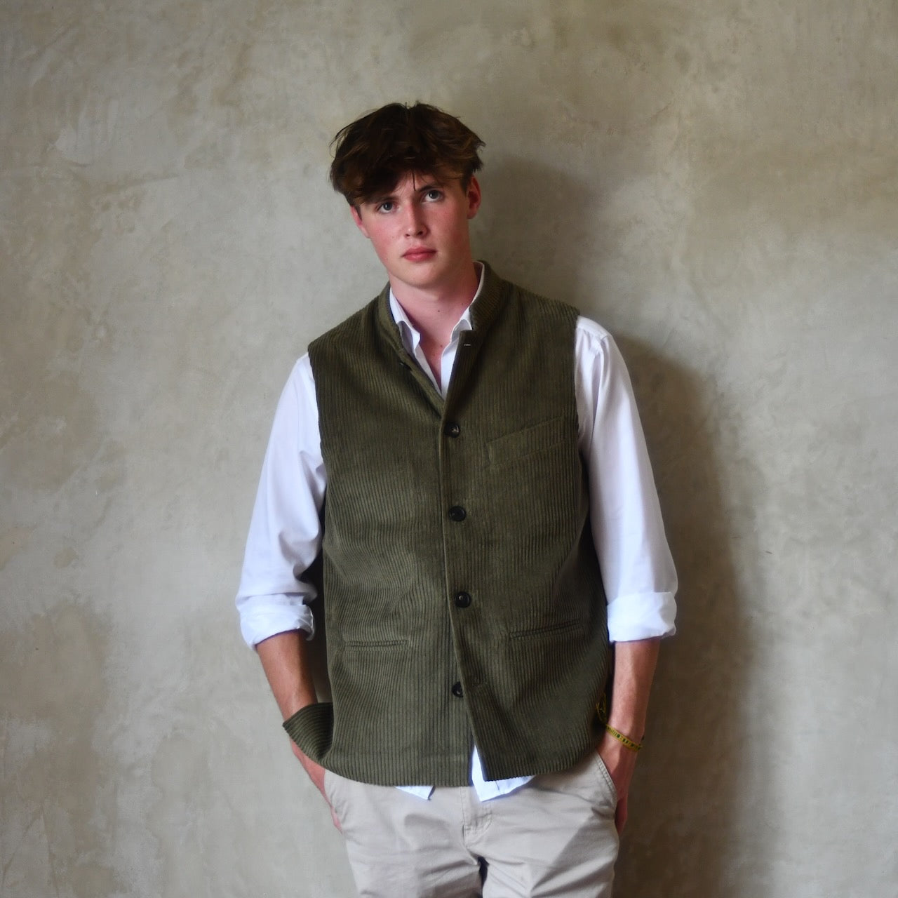 Bespoke Loose Cut Nehru Style Gilet in Khaki Cotton Corduroy. Handmade in London. Shown Over White Shirt, Buttoned.