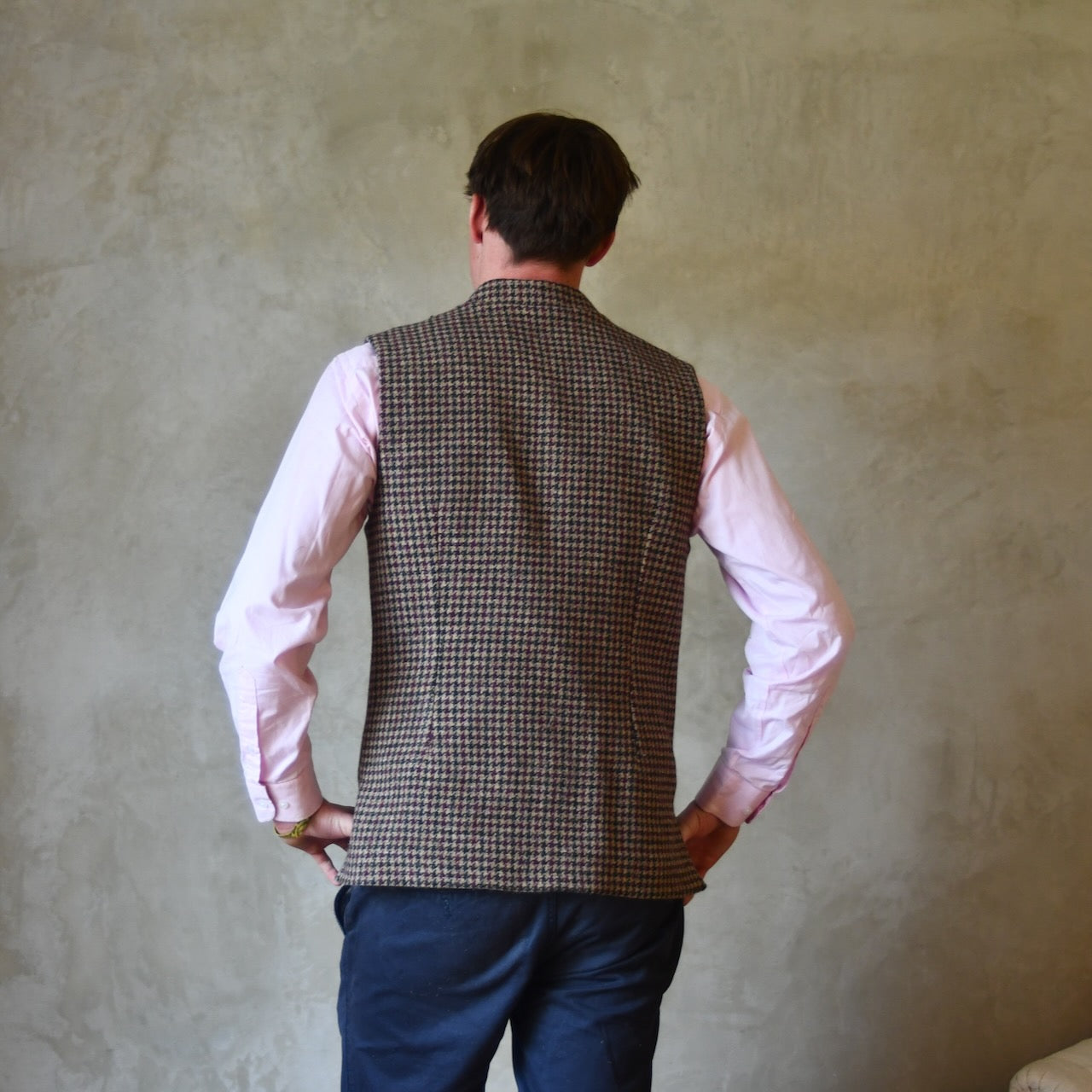 Rear shot of Slim Cut Nehru Style  Gilet in checked pure wool tweed from Lovat Mill. Handmade in London.