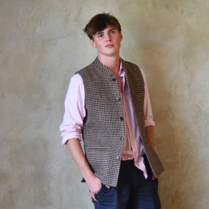 Slim Cut Nehru Style  Gilet in checked pure wool tweed from Lovat Mill. Handmade in London. Worn Open over pink shirt.