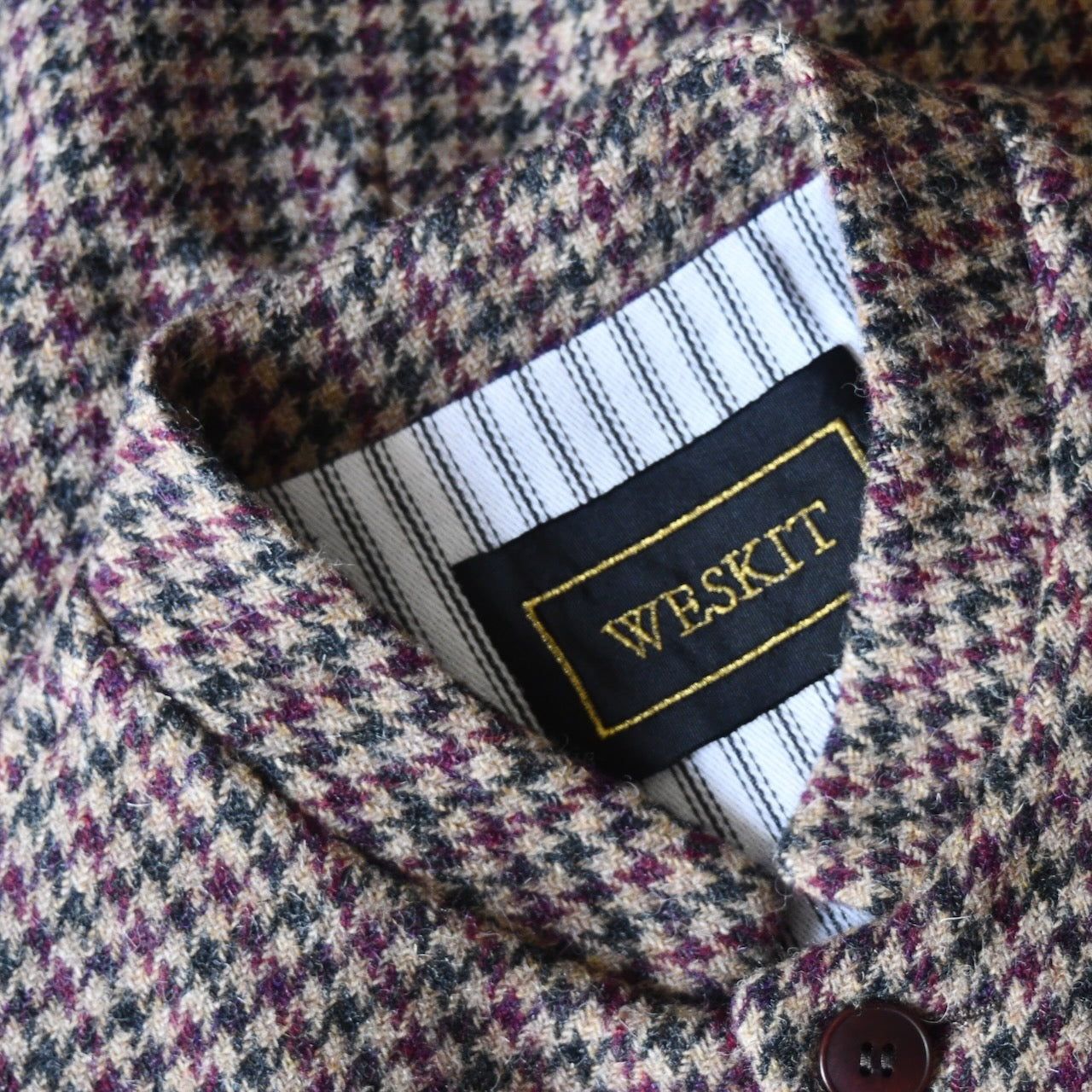 Detail Collar shot of Slim Cut Nehru Style  Gilet in checked pure wool tweed from Lovat Mill. Handmade in London.