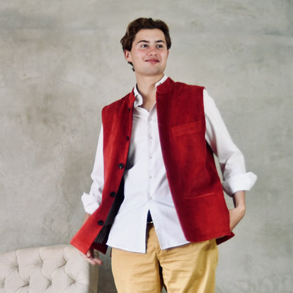 Fitted Nehru-Style Gilet in Claret Corduroy. This pure cotton corduroy gilet has five pockets, neat shaping at the waist to give a nicely tailored look and a five buttoned front. Handmade in London. Open shot.