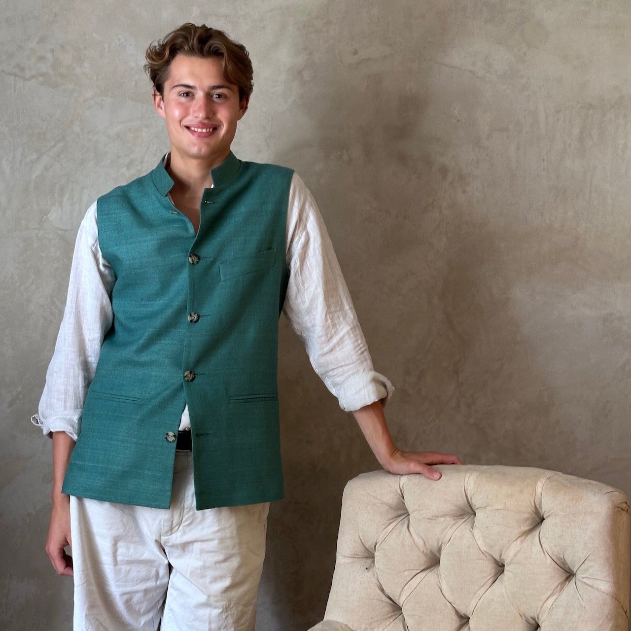 A superb alternative to a jacket in spring and summer or for evening wear with a neat cut and ample pocket space. This pure silk Nehru Style Gilet is handmade in London. Bespoke Options available.