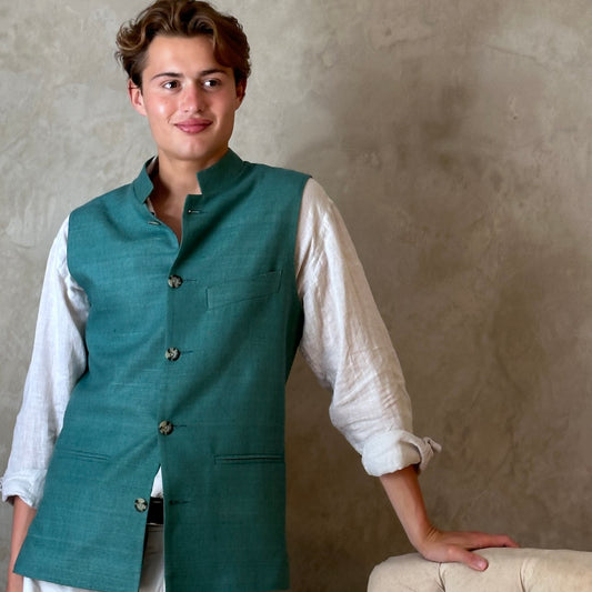 A superb alternative to a jacket in spring and summer or for evening wear with a neat cut and ample pocket space. This pure silk Nehru Style Gilet is handmade in London. Bespoke Options available.