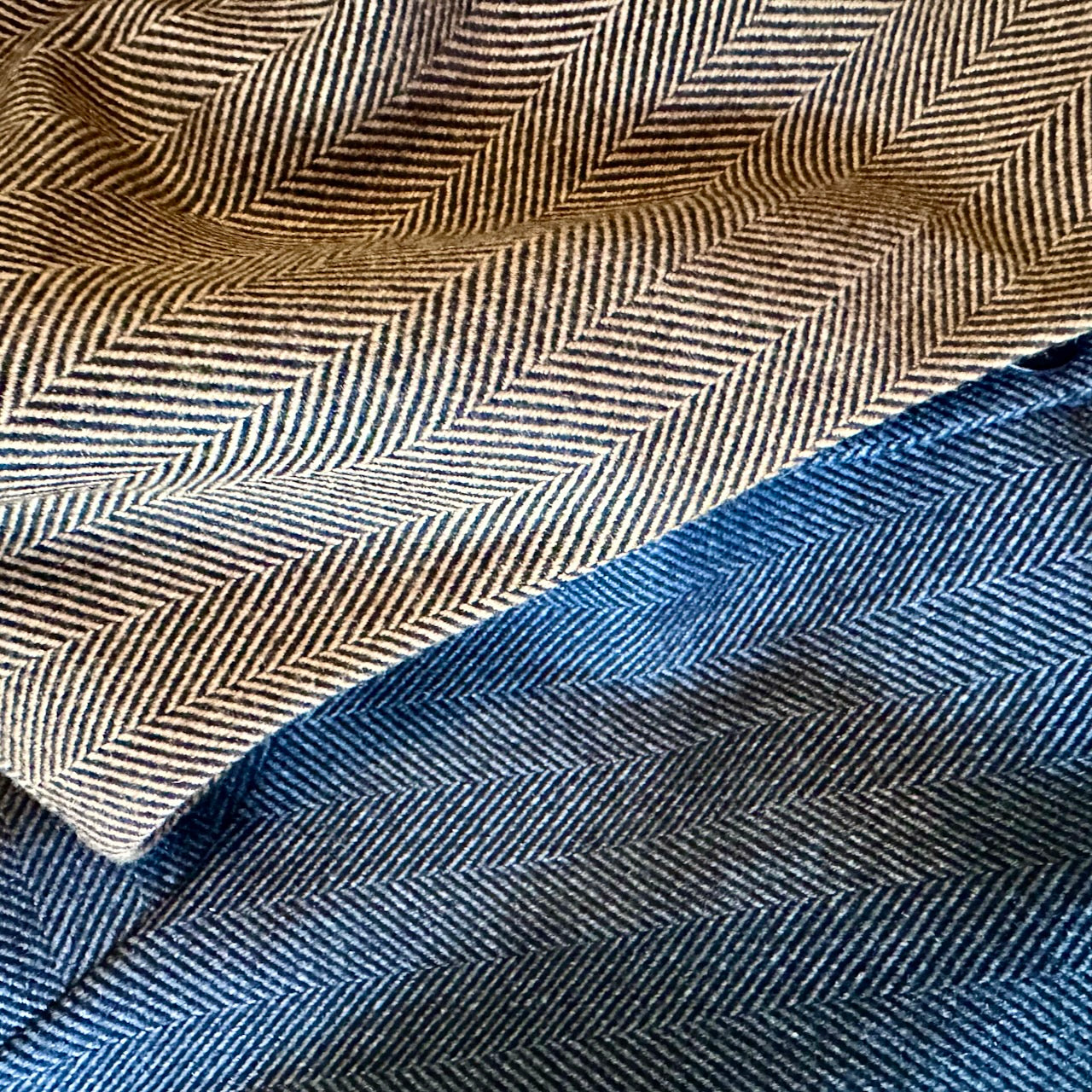 Deep herringbone cashmere mix flannel gilets. Shown in Brown-Black and Charcoal.