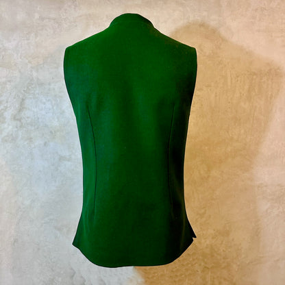 Slim Cut Nehru Style Gilet in bottle or British racing green pure merino flannel. This pure wool gilet is hand made in London. The thick merino wool flannel is woven in Yorkshire by AW Hainsworth. A perfect Town-to-Country dressing solution. Rear View showing tailored darts.