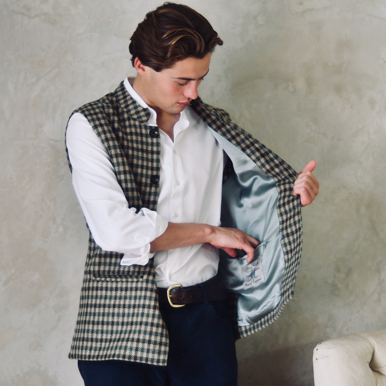 A magnificent and truly luxurious Nehru-Style Gilet in Fox Brothers Green GunClub Check Flannel. Woven in Somerset and Handmade in London, this is the ultimate statement gilet and the top notch in British-made luxury.