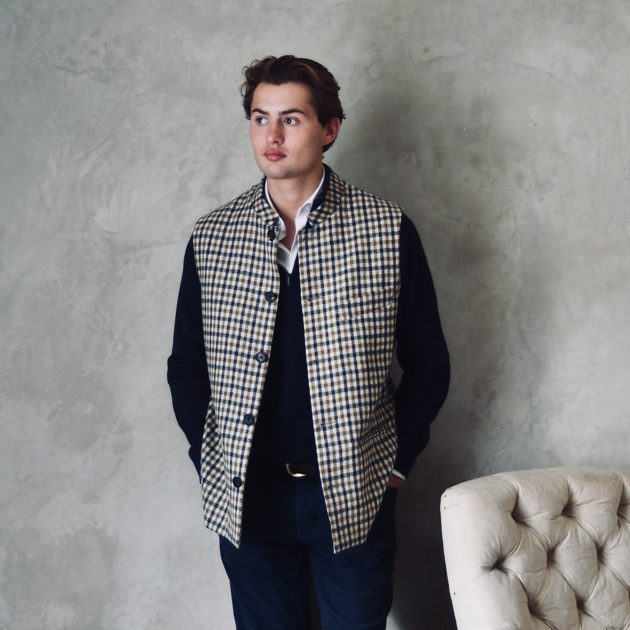 A superbly smart and wonderfully warm alternative to a jacket for autumn winter with a stunning patterning and ample pocket space.
This waistcoat has five button-fronts and side vents for ease when moving and sitting. Fully lined, it has generous inside facings to avoid unsightly lining slippage.
At the chest a welted outbreast pocket sits at a gentle angle to the armhole. Handmade in London. Woven in Somerset.