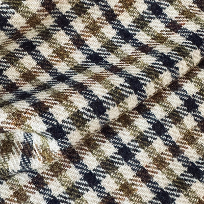 Fabric Close up on a superbly smart and wonderfully warm alternative to a jacket for autumn winter with a stunning patterning and ample pocket space.
This waistcoat has five button-fronts and side vents for ease when moving and sitting. Fully lined, it has generous inside facings to avoid unsightly lining slippage.
At the chest a welted outbreast pocket sits at a gentle angle to the armhole. Handmade in London. Woven in Somerset.