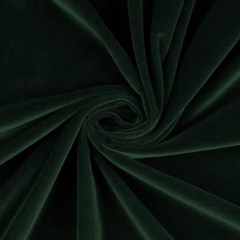 Fabric detail shot of Bottle Green Velvet Nehru-Style Gilet showing ticking lining and embroidered label.
Handmade in London.
Entirely made in Great Britain.