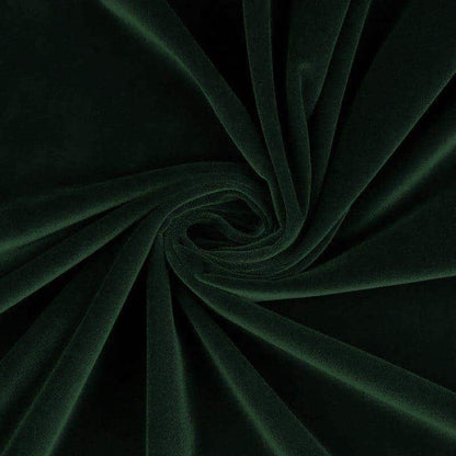 Fabric detail shot of Bottle Green Velvet Nehru-Style Gilet showing ticking lining and embroidered label.
Handmade in London.
Entirely made in Great Britain.