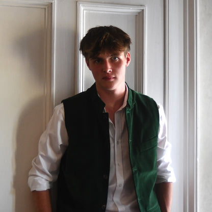 Standing Open unbuttoned model shot of Bottle Green Velvet Nehru-Style Gilet.
Handmade in London.
Entirely made in Great Britain.