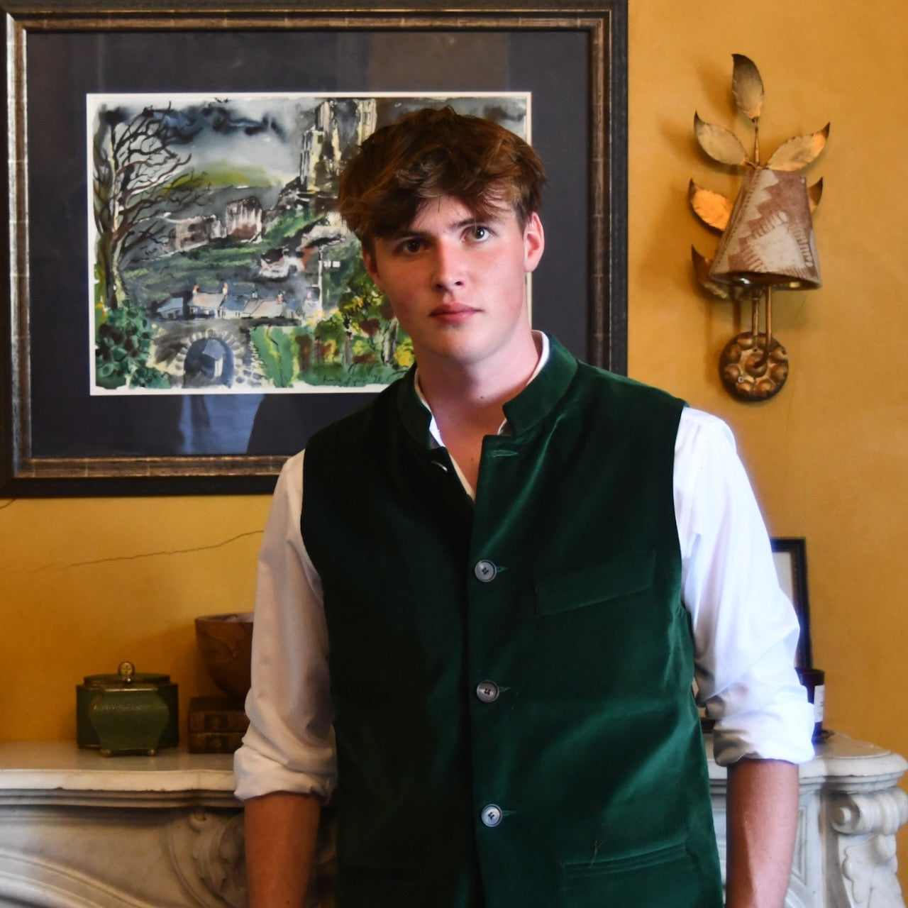 Standing buttoned model shot of Bottle Green Velvet Nehru-Style Gilet.
Handmade in London.
Entirely made in Great Britain.