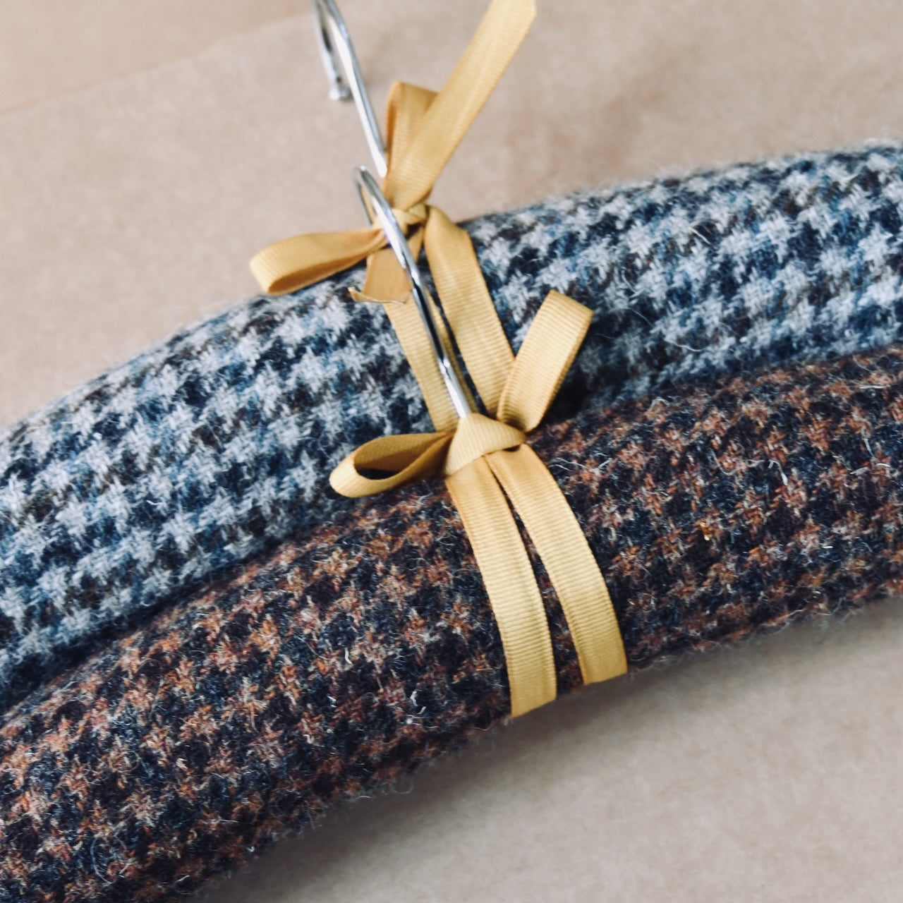 Handmade Checked Tweed Padded Hangers. Made from Cut-offs from Weskit Gilets. Handmade in Great Britain. Zero Waste Making. Sourced from Lovat Tweed.