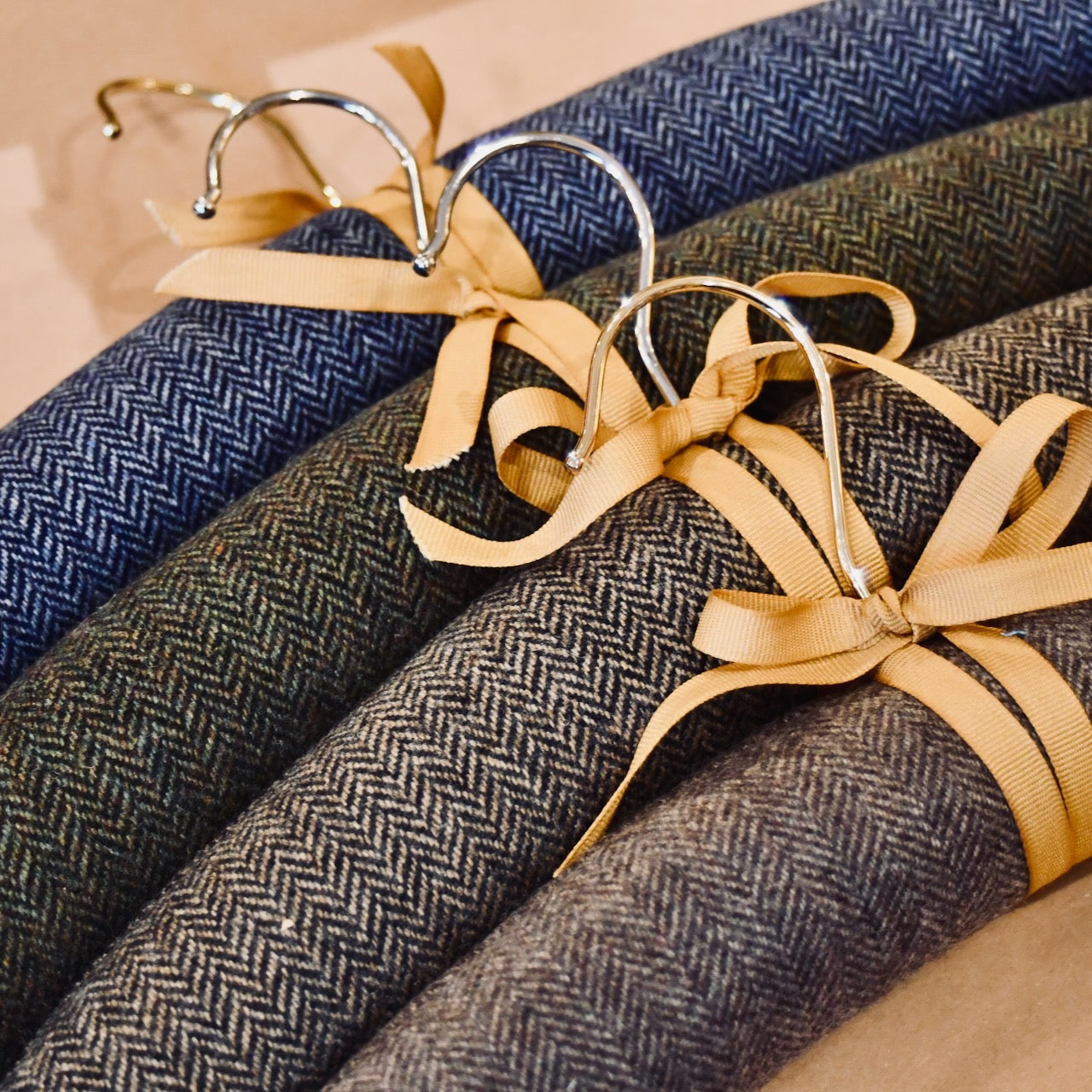Handmade Tweed Padded Hangers. Made from Cut-offs from Weskit Gilets. Handmade in Great Britain. Zero Waste Making.