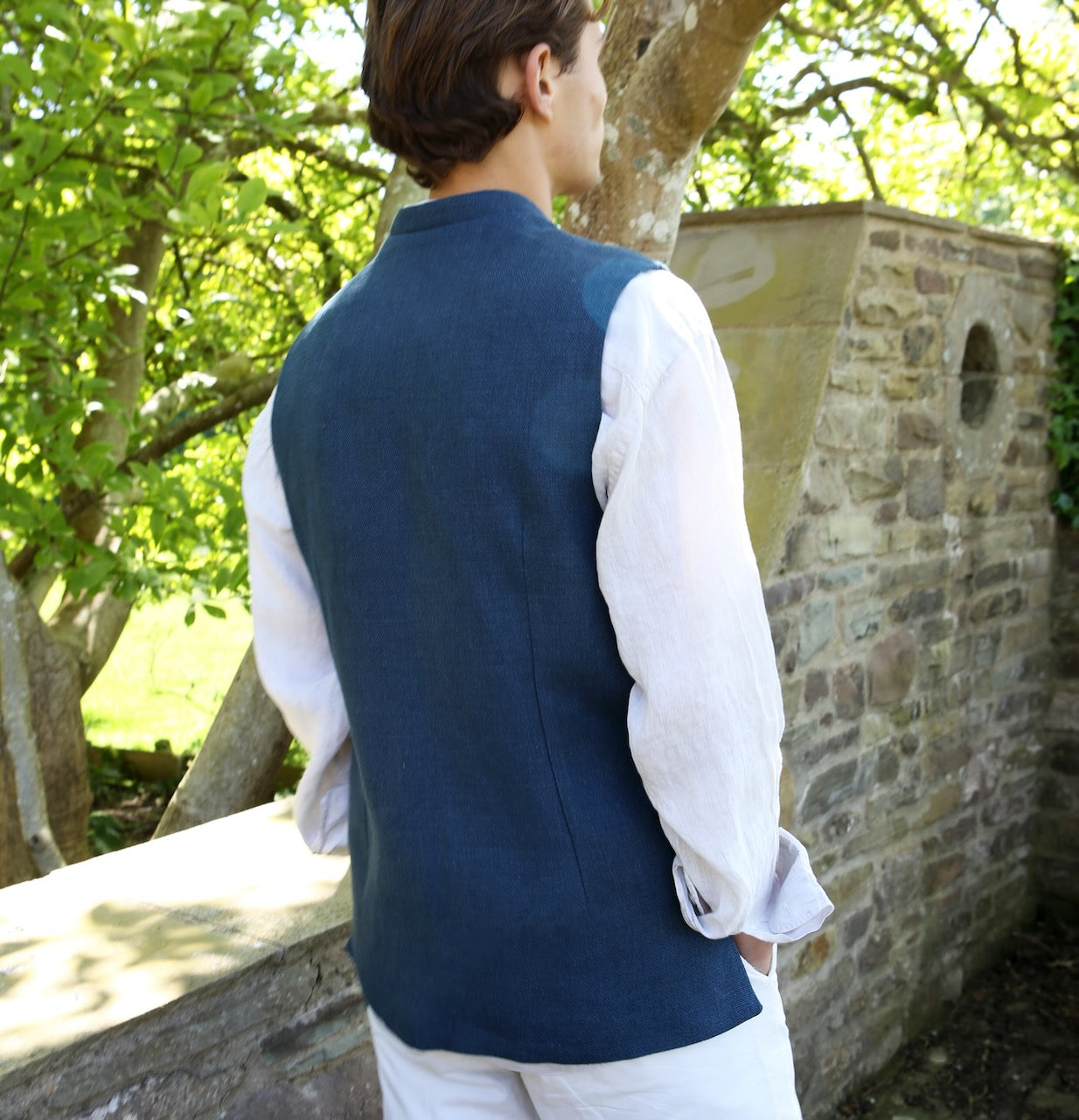 Nehru Style Gilet in Heavy Blue Linen. Irish Linen Gilet, Made by Hand in London. Entirely made in Great Britain. Rear View.