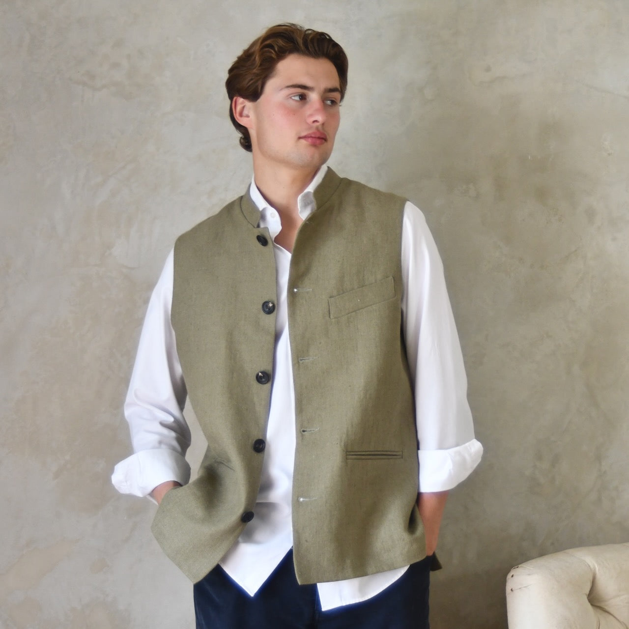Relaxed fit nehru-style gilet in khaki linen. Handmade in London this is a very relaxed waistcoat and a perfect summer alternative to a jacket. Midweight and slubby, the linen outer is fully lined in pure cotton ticking. 
