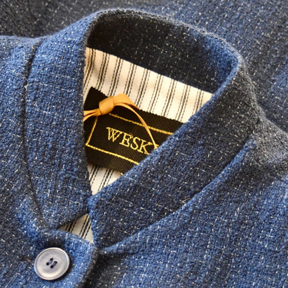 Collar detail on Ladies Waistcoat in Linton Tweeds Boucle. A pure cotton weave,  this is superbly trans-seasonal option. Handmade in London. 