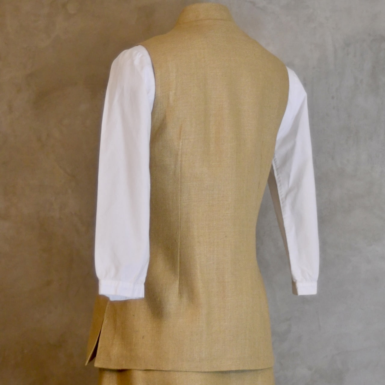 Side Rear View of Ladies Summer Gilet in Sand coloured Silk Matka. Handmade in London.