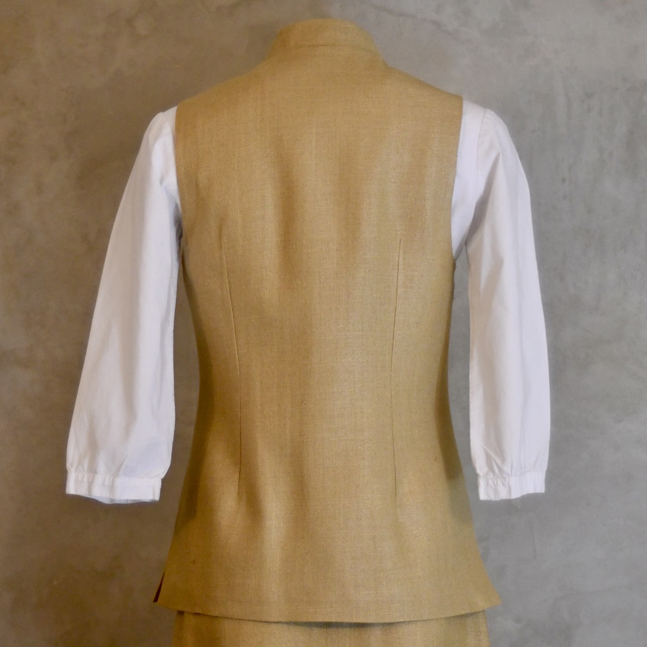 Rear Shot of Ladies Summer Gilet in Sand coloured Silk Matka. Handmade in London.