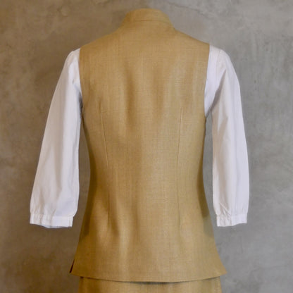 Rear Shot of Ladies Summer Gilet in Sand coloured Silk Matka. Handmade in London.