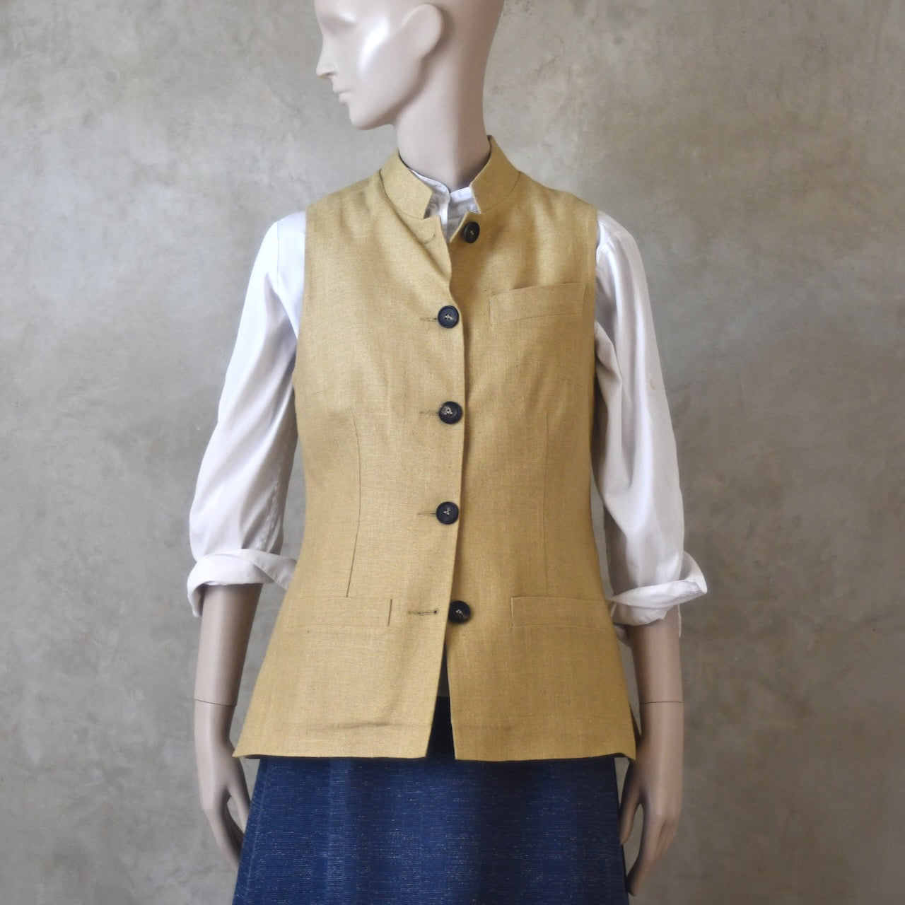 Buttoned front view Ladies Silk Gilet in Sand coloured Silk Matka. Handmade in London with a Nehru Collar and Horn buttons.