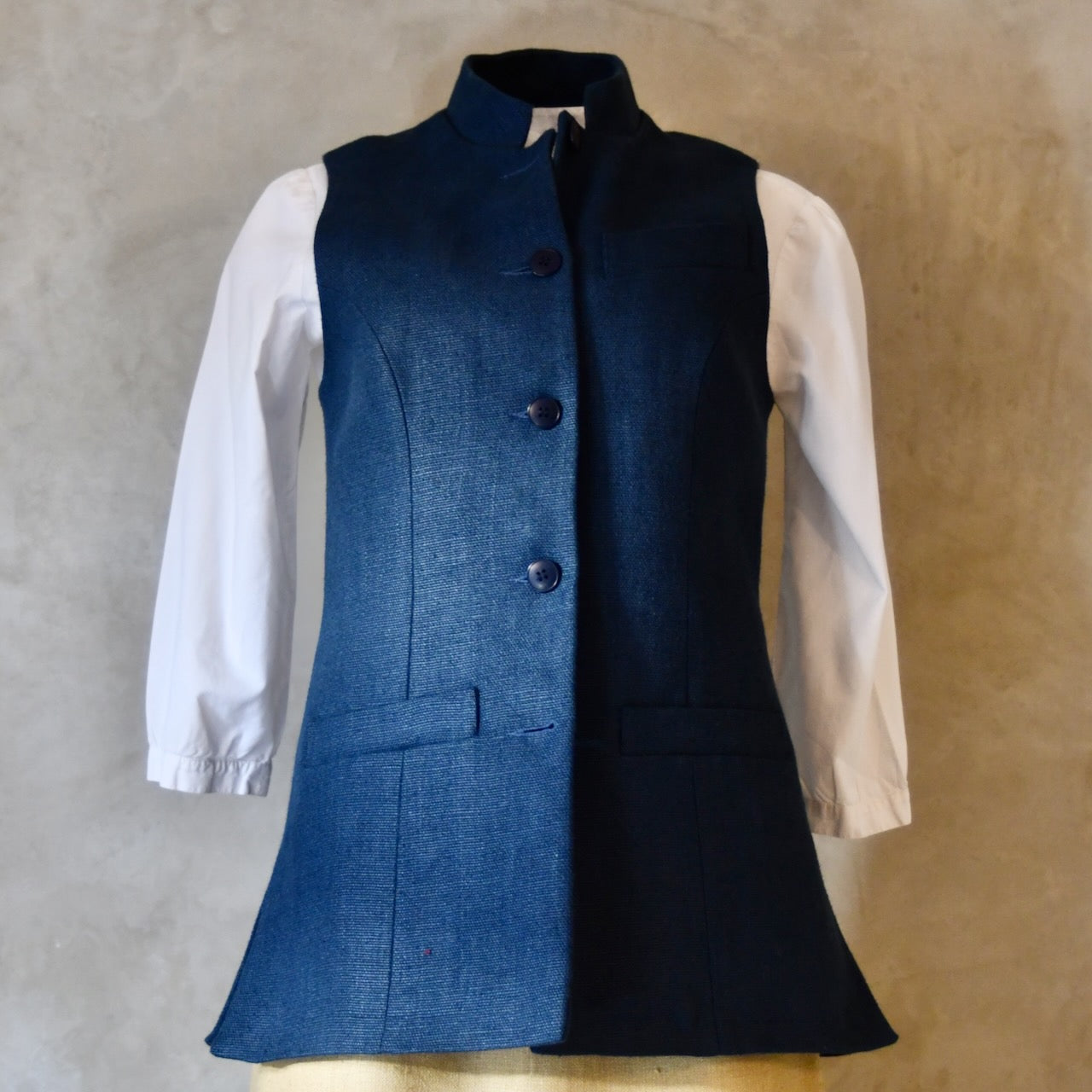 Front Shot of Ladies Gilet in Navy Linen. Made from a Heavy Weight Pure Irish Linen, this waistcoat is hand cut made and finished in London.