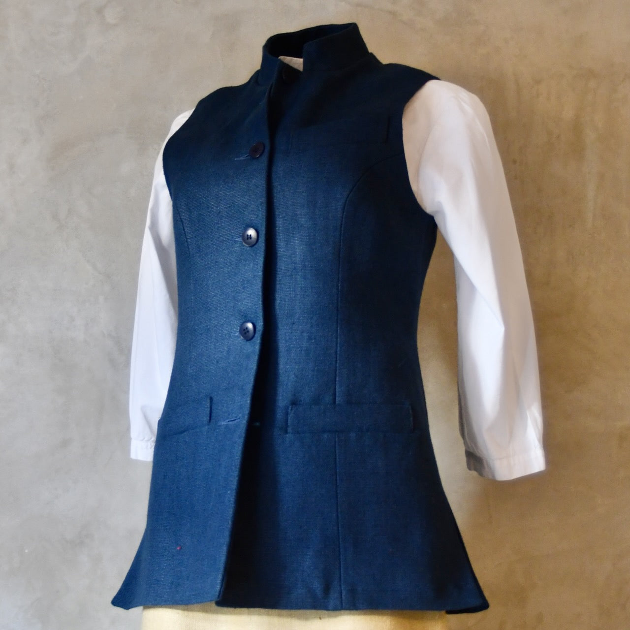 Ladies Gilet in Navy Linen. Made from a Heavy Weight Pure Irish Linen, this waistcoat is hand cut made and finished in London.