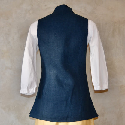 Rear shot of Ladies Gilet in Navy Linen. Made from a Heavy Weight Pure Irish Linen, this waistcoat is hand cut made and finished in London.