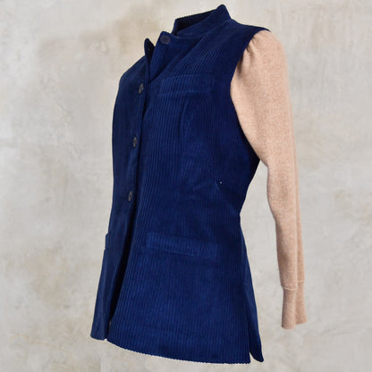 Ladies Dark Navy Cord Waistcoat. This pure cotton corduroy gilet is handmade in London. With a mandarin collar and smart cotton stripe ticking this gilet is made to last and last.