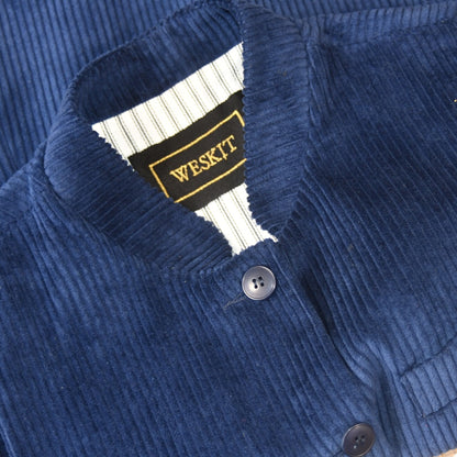 Collar View of Ladies Dark Navy Cord Waistcoat. This pure cotton corduroy gilet is handmade in London. With a mandarin collar and smart cotton stripe ticking this gilet is made to last and last.