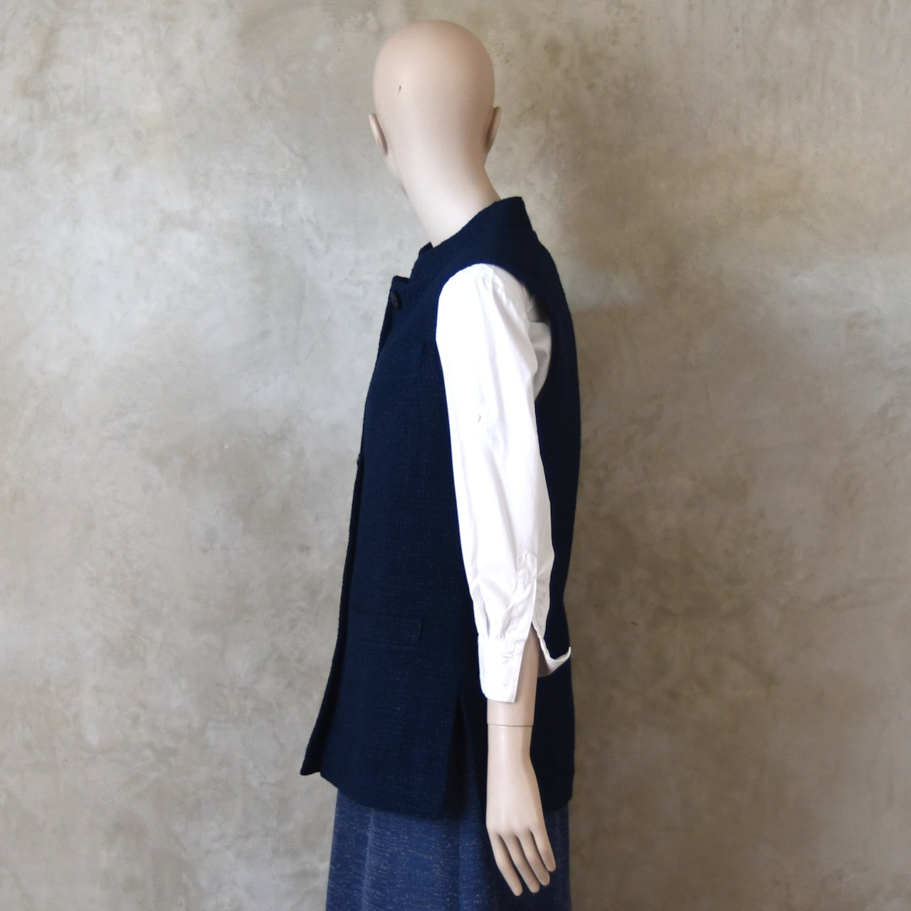 Side shot of Longer Length Ladies Waistcoat in Linton Tweeds Boucle. A pure cotton weave,  this is superbly trans-seasonal option. Handmade in London. 