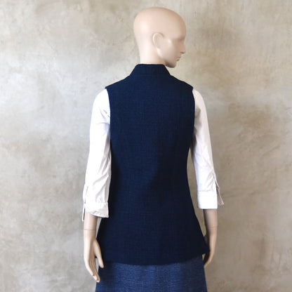 Back shot of Longer Length Ladies Waistcoat in Linton Tweeds Boucle. A pure cotton weave,  this is superbly trans-seasonal option. Handmade in London. 