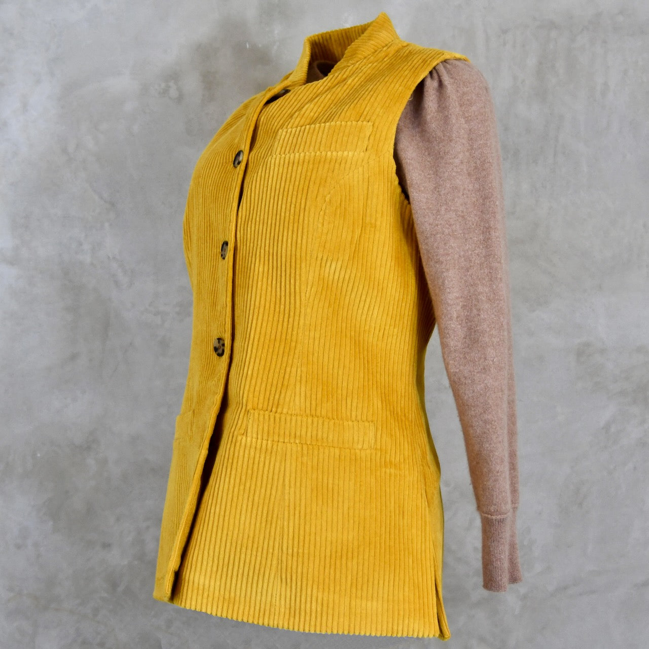 Ochre-Coloured Ladies Gilet. A pure cotton corduory ladies waistcoat with a longer length and waist shaping. Handmade in London.