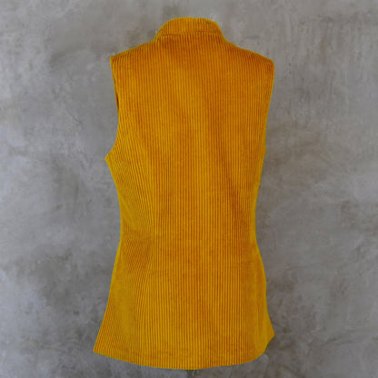 Rear view of Ochre-Coloured Ladies Gilet. A pure cotton corduory ladies waistcoat with a longer length and waist shaping. Handmade in London.