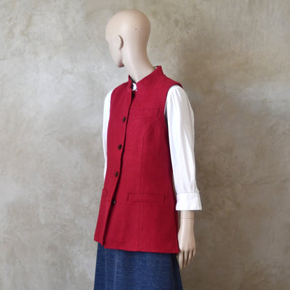 Buttoned up Side shot of Ladies Shaped Gilet in Red Irish linen. Handmade in London with a Nehru Collar and Cotton Ticking Lining.