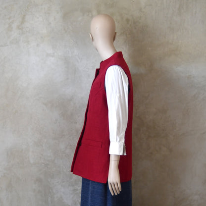 Side shot of Ladies Shaped Gilet in Red Irish linen. Handmade in London with a Nehru Collar and Cotton Ticking Lining.