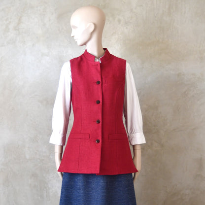 Full on front shot of Ladies Shaped Gilet in Red Irish linen. Handmade in London with a Nehru Collar and Cotton Ticking Lining.