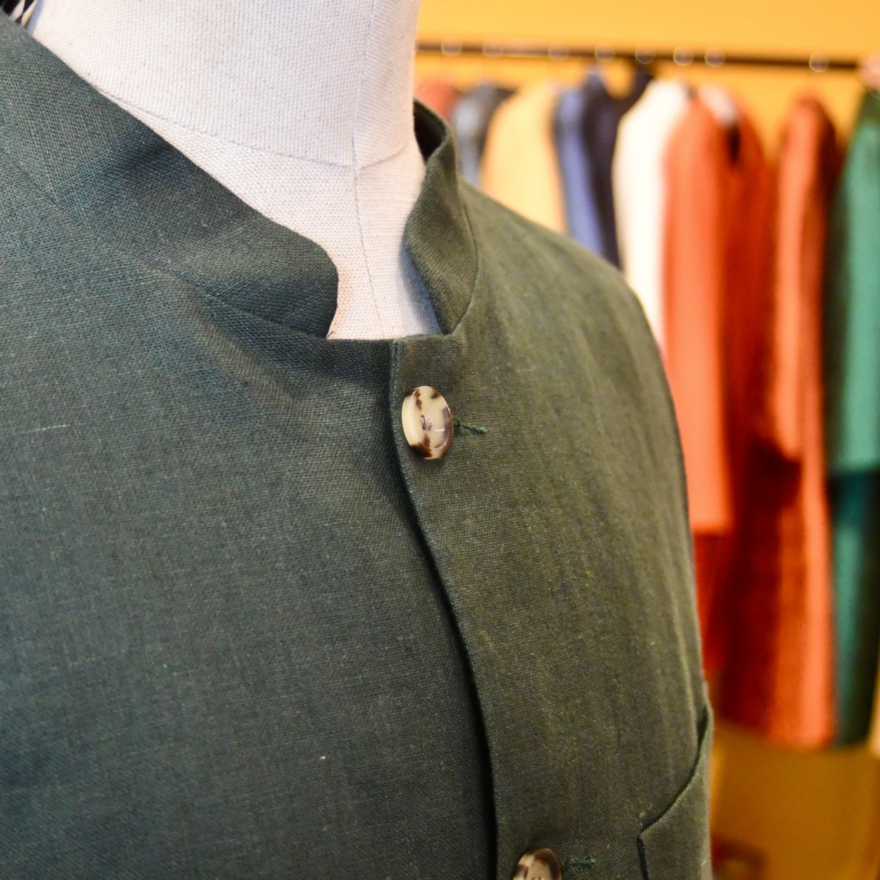 Loose Cut Nehru-Style Gilet in Fine Gree Linen A superb alternative to a jacket with a neat cut and ample pocket space. Smart enough to go out in and relaxed enough for the every-day. 
